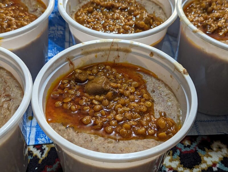 Sholeh covered with a layer of ghaymeh, a common Iranian Persian stew. Mashhad, Iran. Copyright Ali Torkzadeh