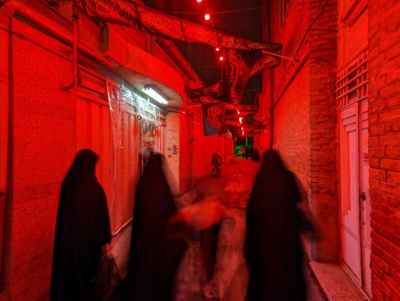 People getting free food on the commemoration observance of the death of Zahra Fatemeh, daughter of Prophet Muhammad. Copyright Ali Torkzadeh, EscapefromTehran.com